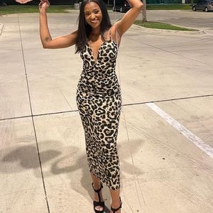 Fitted leopard print cocktail dress (Jluxlabel). Size small.